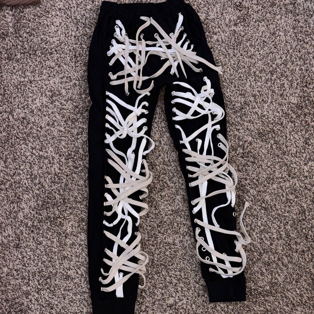 Black Pants with White Lace-Up Design